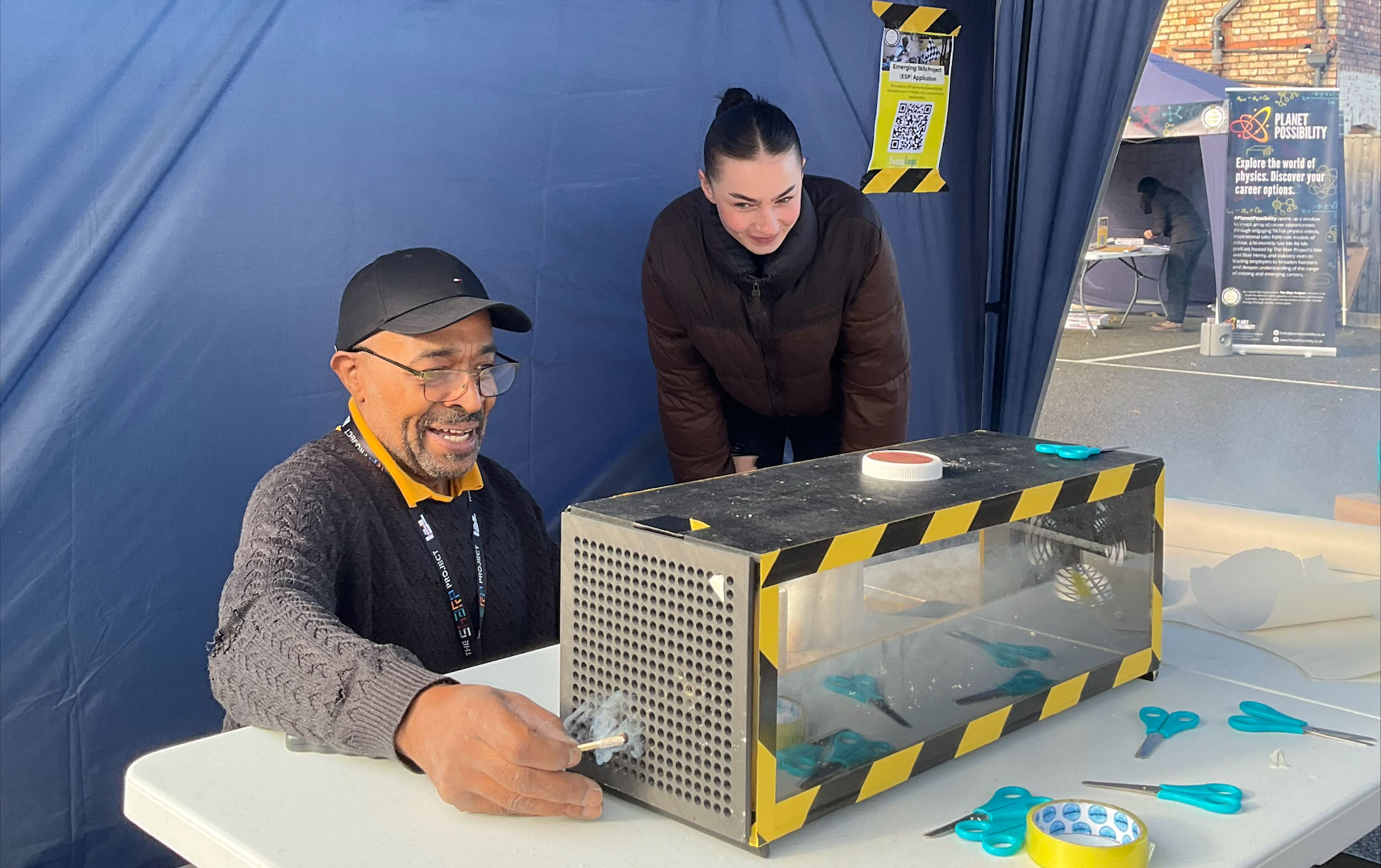 Student observes wind tunnel demonstration at Stretford Campus
